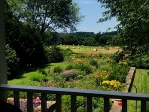 Garden with farm fields in Waterford Virginia